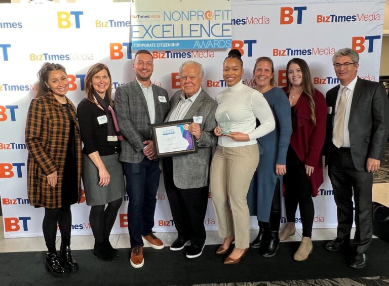 MLG Capital team with 2023 Corporate Citizen of the Year award